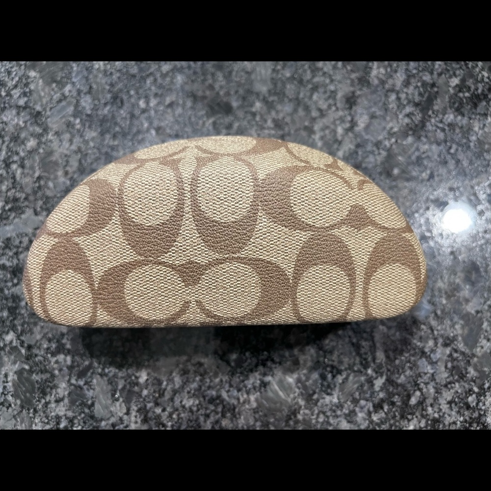 Coach glasses case. Never used. Mint condition. Smoke free and pet free home.